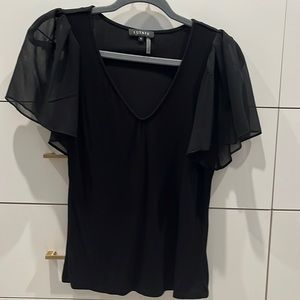 1. State ribbed fluttered sleeve top.